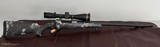 WEATHERBY MARK V BACKCOUNTRY 2.0 TI 6.5-300 Wby. - PREOWNED w/Leupold VX6 HD
