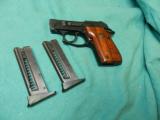  TAURUS PT 22 WITH TWO MAGS - 1 of 4