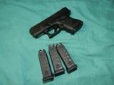 GLOCK MODEL 26 IN 9MM WITH FOUR MAGS - 1 of 6