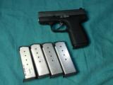 KAHR PM 45 IN .45ACP, 5 MAGS - 1 of 7