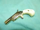 COLT .22 GOLD DERRINGER - 1 of 4