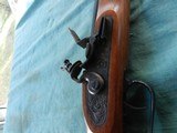 Thompson Center .54 cal.
Flintlock Rifle - 3 of 17