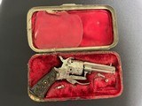 scarce tiny folding trigger pinfire revolver w/period case. interesting story.