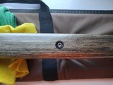 SAVAGE116 in 270 win. STAINLESS STEEL FLUTED BARREL WITH A FACTORY ADJUSTABLE MUZZLE BRAKE, GREEN LAMINATED STOCK, VERY HARD TO FIND MODEL! - 14 of 17