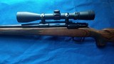 REMINGTON MODEL*798* LAMINATED STOCK -300 WINCHESTER MAGNUM with Removable muzzle brake, and a 3-9,x 40 mm redfield scope Mfg by Leupold duplex 98-99% - 13 of 16