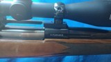 REMINGTON MODEL*798* LAMINATED STOCK -300 WINCHESTER MAGNUM with Removable muzzle brake, and a 3-9,x 40 mm redfield scope Mfg by Leupold duplex 98-99% - 7 of 16