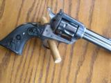 Colt New Frontier
4 1/2"
2 cylinders
Mint - 3 of 6