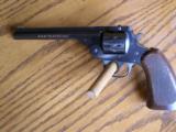 H&R
22 Special break top revolver 98% - 2 of 2