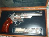 Smith & Wesson model 629 stainless .44 Remington Mag. Engraved - 1 of 3
