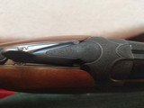 Beretta 682 Gold O/U 12 Gauge with 30 3/4" barrels, eight Briley extended chokes - 22 of 23