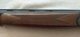 Beretta 682 Gold O/U 12 Gauge with 30 3/4" barrels, eight Briley extended chokes - 10 of 23