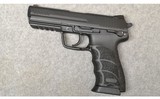 H&K ~ HK45 ~ .45 Auto - 2 of 3