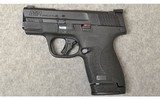 Smith & Wesson ~ M&P9 Shield ~ 9MM Luger - 2 of 3