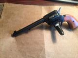 Rough Rider single action revolver , 22 LR and 22 magnum , Blued , nib
- 1 of 5