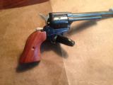 Rough Rider single action revolver , 22 LR and 22 magnum , Blued , nib
- 5 of 5
