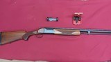 Savage M389 12 ga /222 Remington - 1 of 14
