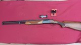 Savage M389 12 ga /222 Remington - 2 of 14