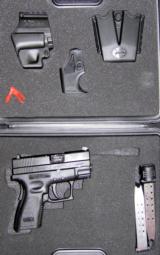 SPRINGFIELD XD-SC (Sub-Compact) PISTOL 9MM with 1-13 RD and 1-16 RD MAGAZINE'S and XD MAG POUCH & HOLSTER GEAR SYSTEM (NIB). Item #XD9801HCSP06.- 1 of 1