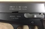 Smith & Wesson Model 3914 9mm Pistol in original box w/all goodies - Minty -
- 6 of 7