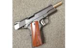 Remington 1911 R1
.45 ACP - 3 of 5