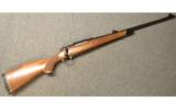 Winchester Model 70 in .338 Win Mag - 1 of 7