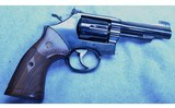 SMITH~&~WESSON~MODEL~48-7~.22MRF - 1 of 2