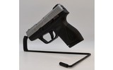 Taurus~PT 709~9MM - 3 of 3