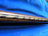 Kentucky Relief Carved Golden Age Rifle 45 caliber Percussion Full Tiger-Striped
Stock
- 7 of 12