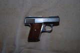 Raven Arms MP25 .25 ACP pistol - 1 of 2