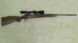 Remington Model 700 Bolt Action Rifle in .22-250 Caliber with Burris Signature Scope - 1 of 15