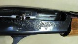 Remington Model 1100 Semi-Auto 12 Gauge Shotgun with Lyman "Cutts" compensator - 19 of 20