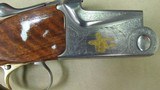 SKB Model 685 Sporting Clays O/U 12 Gauge Shotgun Engraved with Gold Inlays - 1 of 18