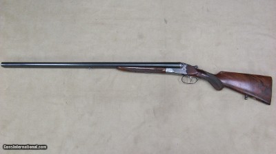 J.P, Sauer 12 Gauge Double Barrel Shotgun with 2 3/4 Inch Chambers, Auto Ejectors, Single Trigger, Engraving and Semi Fancy Wood