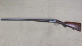 J.P, Sauer 12 Gauge Double Barrel Shotgun with 2 3/4 Inch Chambers, Auto Ejectors, Single Trigger, Engraving and Semi Fancy Wood