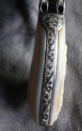 Colt SAA engraved with carved one piece pearl grips - 12 of 12