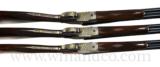 Marcel Thys 3 Gun Set 12, 20, 28 Gauge Ejectors 15" LOP, New Cond Engraved with Gold Inlay.
- 3 of 6