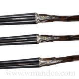 Marcel Thys 3 Gun Set 12, 20, 28 Gauge Ejectors 15" LOP, New Cond Engraved with Gold Inlay.
- 4 of 6