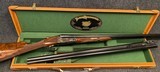 parker reproductions straight hand double trigger bhe 20 ga 0 frame composed 2bbl set with original 1 barrel case.