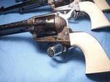 Colt
Set of Three 3rd Generation Single Action Army Revolvers A,B, C Engraved all with Checkered Ivory Grips 1977 - 3 of 15