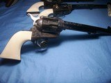 Colt
Set of Three 3rd Generation Single Action Army Revolvers A,B, C Engraved all with Checkered Ivory Grips 1977 - 6 of 15
