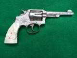 S&W MODEL 1905
32-20 HAND EJECTOR - ENGRAVED - CARVED PEARL GRIPS - NICKEL - MINT CONDITION - 1 of 8