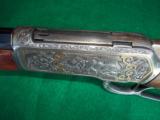 WINCHESTER 1886
EARLY
.50 EXPRESS GOLD INLAID ENGRAVED – EXQUISITE RESTORATION -
MUST SEE!
- 12 of 15
