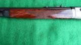 WINCHESTER 1886 DELUXE TD 45-70 EXTRA LT WT IN NEAR MUSEUM CONDITION WITH MANY SPECIAL FEATURES
- 2 of 11