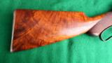 WINCHESTER 1886 DELUXE TD 45-70 EXTRA LT WT IN NEAR MUSEUM CONDITION WITH MANY SPECIAL FEATURES
- 8 of 11