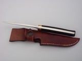 Jean Tanazacq custom made
full tang constructed model " RIEZE" Black micarta handle, single brass guard, brown leather scabbard, - 4 of 12