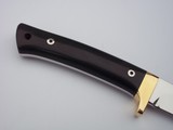 Jean Tanazacq custom made
full tang constructed model " RIEZE" Black micarta handle, single brass guard, brown leather scabbard, - 7 of 12