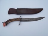 James L. Batson, Jr. "Soultaker" Damascus-bladed knife, crown stag handle carved by Paul G. Grussenmeyer 1994 - 1 of 12