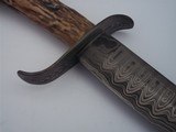 James L. Batson, Jr. "Soultaker" Damascus-bladed knife, crown stag handle carved by Paul G. Grussenmeyer 1994 - 5 of 12