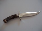 Randall Model # 12-8" Bear Bowie Double German Silver guard With Forward Curve India Sambar crown Stag Handle carved with Mountain Man and Racoon - 2 of 4