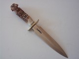 randall model # 2 7" fighting stilettocarved handle with 18 faces a masterpiece original scabbard